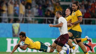 Australia's Will Genia scores a try. AFP