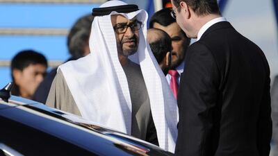 Sheikh Mohammed bin Zayed, Crown Prince of Abu Dhabi and Deputy Supreme Commander of the Armed Forces, and Sheikh Abdullah bin Zayed, Minister of Foreign Affairs, below, arrive at Schiphol airport in Amsterdam for the Nuclear Security Summit in The Hague. Photos John Thys / EPA