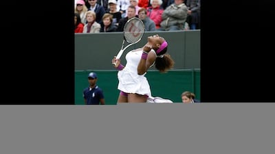Serena Williams of the United States reacts after defeating Yaroslava Shvedova of Kazakhstan during a fourth round singles match at the All England Lawn Tennis Championships at Wimbledon, England, Monday, July 2, 2012. (AP Photo/Kirsty Wigglesworth)