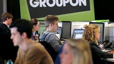 Customers have been complaining Groupon is taking a long time to deliver their online purchases. Scott Olson / Getty Images / AFP
