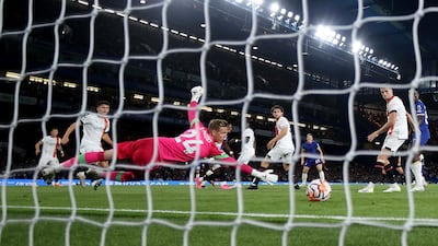 Luton goalkeeper Thomas Kaminski is beaten by Raheem Sterling's strike that put Chelsea in front. Getty