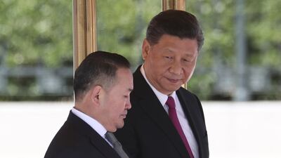 Mongolian President Khaltmaagiin Battulga and Chinese President Xi Jinping attend the welcome ceremony at the Great Hall of People in Beijing, China. Getty Images