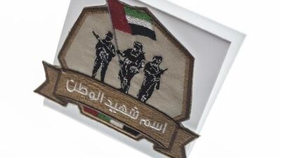 A display featuring one of the badges that will be labelled with the name of a martyr and then sent to the International Space Station and given to the family upon its return. Antonie Robertson / The National