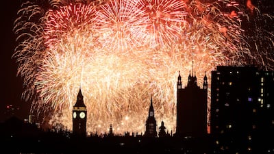 Fireworks burst in the sky around the London Eye and The Elizabeth Tower, commonly known by the name of the clock's bell, "Big Ben", at the Palace of Westminster, London. AFP