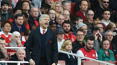 Arsene Wenger watches on during Arsenal's 2-2 Premier League draw with Manchester City on Sunday. Andy Rain / EPA