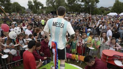 A birthday cake including a statue depicting Lionel Messi is seen during a party organised by the village of Bronnitsy. AFP