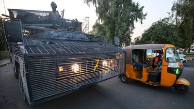 Iraqi police are seen deployed in Baghdad's predominantly Shiite Sadr City. Demonstrations across Baghdad and the south have spiralled into violence over the last week, with witnesses reporting security forces using water cannons, tear gas and live rounds and authorities saying "unidentified snipers" have shot at protesters and police. On Sunday evening a mass protest in Sadr City in east Baghdad led to clashes that medics and security forces said left 13 people dead. AFP