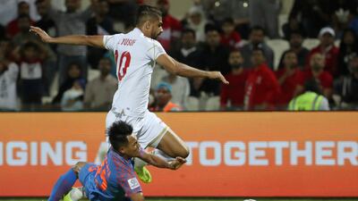 India's Udanta Singh fights for the ball with Bahrain's forward Abdulla Yusuf Helal. AFP