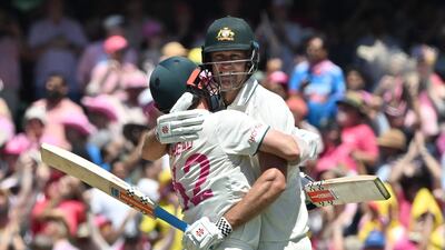 Australia’s Travis Head, left, and Beau Webster celebrate victory against India in the fifth and final Test match at the Sydney Cricket Ground. AFP