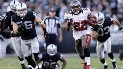 Tampa Bay Buccaneers running back Doug Martin (22) has been playing a game of follow the leader and the rookie is the one at the front of the pack.