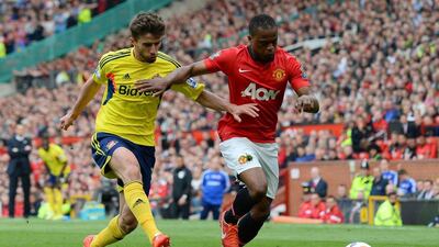 Patrice Evra has appeared in 32 Premier League matches for Manchester United this season. Andrew Yates / AFP