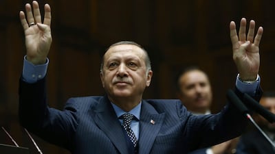 Turkey's President Recep Tayyip Erdogan addressing supporters at the parliament in Ankara, Turkey last year. AP