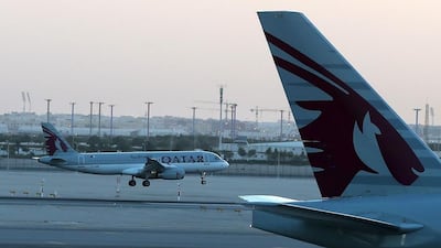 Limitations on the movement of individuals, airspace and Qatar’s land-border have impacted the tourism and transport industry, most notably the fortunes of Qatar Airways. Karim Jaafar / AFP