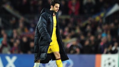 Cesc Fabregas, of Arsenal, leaves the field at the end of the Uefa Champions League round of 16 second leg match against Barcelona.