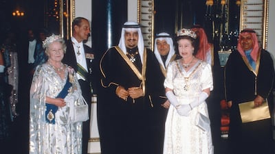 Queen Elizabeth ll; Queen Elizabeth, the Queen Mother; Prince Philip, Duke of Edinburgh and King Fahd of Saudi Arabia attend a State Banquet at Buckingham Palace on March 1, 1987 in London, England. Anwar Hussein / Getty Images