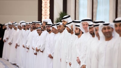 Members of the Ministry of Presidential Affairs attend an iftar reception at Abu Dhabi's Al Bateen Palace.