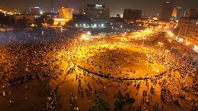People gather in Tahrir square to celebrate the anniversary of an attack on Israeli forces during the 1973 war, in Cairo, Egypt. Mohamed Abd El Ghany / Reuters