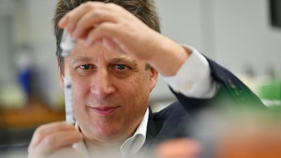 Nikolai Petrovsky, research director at Vaxine, an Australian biotechnology company, holds a syringe with a vaccine specimen at the Flinders University lab, in Adelaide, Australia. The first potential coronavirus vaccine developed in the southern hemisphere is set to begin human trials in Adelaide. EPA