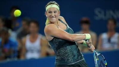 Victoria Azarenka of Belarus plays a backhand during her match against Sabine Lisicki of Germany on day four of the Brisbane International in Brisbane, Australia.