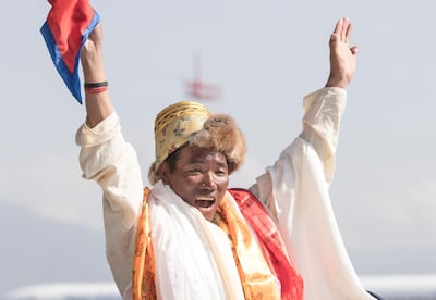 Nepalese veteran mountaineer Kami Rita gestures after arriving at Kathmandu Airport in Kathmandu, Nepal, 25 May 2019. EPA