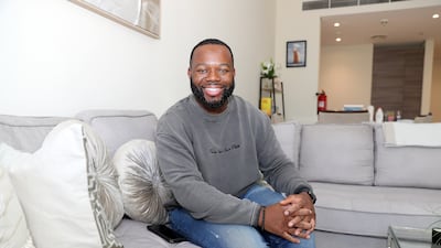 David Wurie, from the UK, loves life in his two-bedroom apartment in Dubai's Business Bay. All photos Pawan Singh / The National