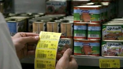 As Lebanon wilts in the summer heat, the mood at the country's supermarkets seem to reflect the general malaise. Jamal Saidi / Reuters