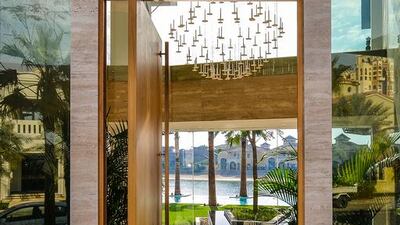 An entrance to the house via the garden. Courtesy Ocean View Real Estate