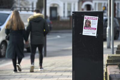A poster asks people for any information about missing woman Sarah Everard in the Clapham Common area of London. AP