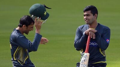 Umar Akmal, right, had been "pencilled in" for Pakistan's T20 squad until the disciplinary hearing surfaced. Aamier Qureshi / AFP