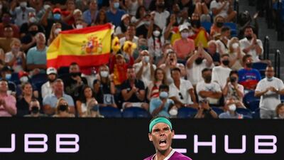 Rafael Nadal celebrates winning the fourth set. Reuters