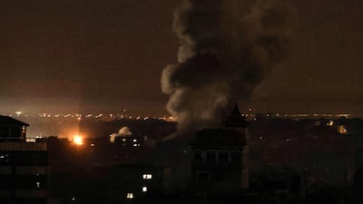 Smoke rises from buildings after Israeli strikes on Rafah, in the southern Gaza Strip. Hamas and Israel have agreed to a temporary truce. AFP