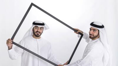 Hamad Al Shirawi, left, and his brother Abdulla have set up a Dubai branch of a US-based business that creates custom-framed portraits within 90 minutes. Reem Mohammed / The National
