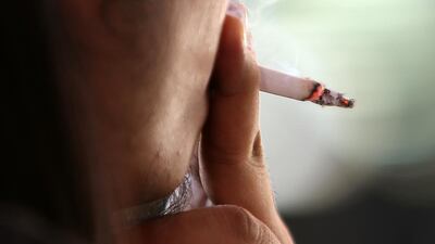 Readers debate whether smoking should be banned in private spaces. Pawan Singh / The National