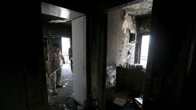 Two Bangladeshi cleaners, Mohammed Salim and Mohammed Soybs, both 28, were on hand to help residents to clear the debris from the balcony.