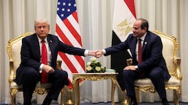 Donald Trump holds Egyptian President Abdel Fattah El Sisi's hand during a meeting in October, when Egypt hosted a summit on ending the Gaza war. Reuters