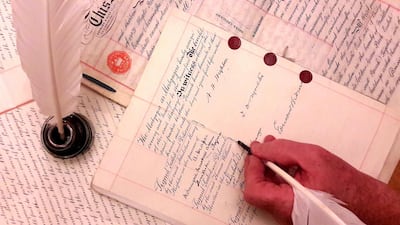 Writing on parchment with a quill. Courtesy Sean P Doherty