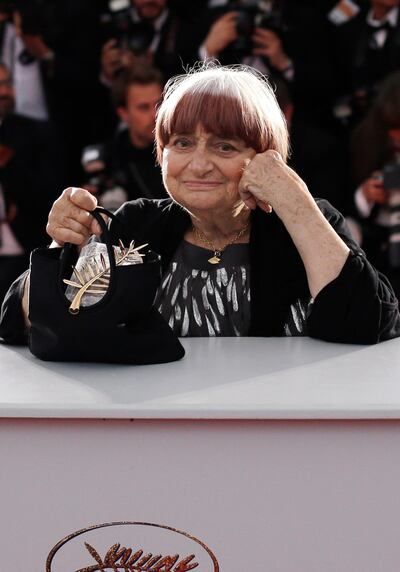 Agnes Varda holds the Honorary Palme d'Or award at the Cannes Film Festival
