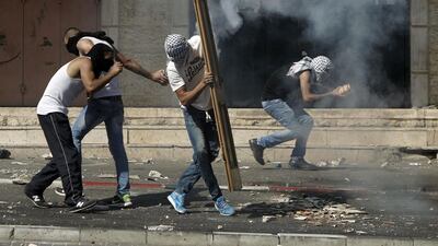 Israeli police spokesman Micky Rosenfeld said police had been notified of a youth ‘pulled into a vehicle and possibly kidnapped’ and roadblocks were set up in search of suspects. Ahmad Gharabli/AFP Photo