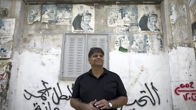 Jehad Tomaleh - seen here in the Al Amari refugee camp near Ramallah on August 20, 2017 - was dismissed by President Mahmoud Abbas from Fatah last year for calling a meeting of supporters of Mohammed Dahlan. He says Dahlan's exclusion from Fatah is harming the movement. Heidi Levine for The National