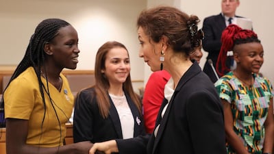 French UNESCO general manager Audrey Azoulay, right, meets with girls during the "Education for Girl" meeting at the UN headquarter. AFP