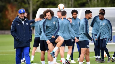 Chelsea manager Maurizio Sarri, left, with David Luiz at the club's training ground in Cobham on Wednesday night. Andy Rain / EPA
