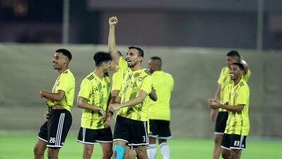 UAE player Walid Abbas celebrates during training before the game between the UAE and Vietnam. Chris Whiteoak / The National