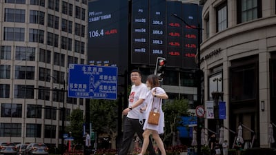 A screen showing stock exchange updates in Shanghai, China. EPA