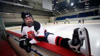 James Tester sretches before a Scorpians scrimmage at the Abu Dhabi Ice Skating Arena.