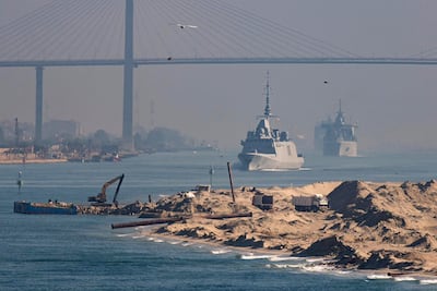 The French Navy's carrier strike group is escorted through the Suez Canal en route to the southern Red Sea. AFP