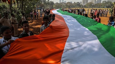 Students hold portion of the 352-metre long Indian national flag during a rally ahead of Republic Day, in Mumbai, India. EPA