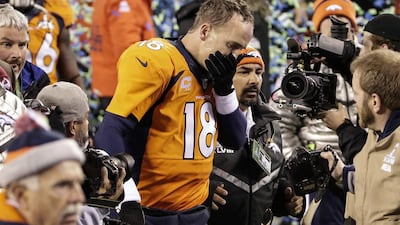 Denver Broncos quarterback Peyton Manning leaves the field at the end of the Super Bowl on Sunday. Jason Szenes / EPA