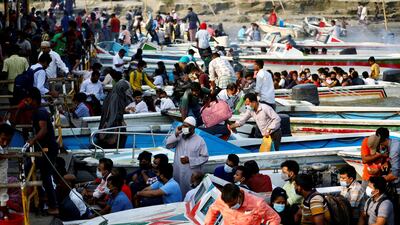 Migrants and workers in Bangladesh leave in speedboats ahead of the countrywide Covid-19 lockdown. Reuters