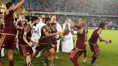 Al Wahda captain Ismail Matar celebrates with the President’s Cup.
