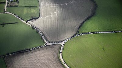 Spectators' cars are parked as they attend the start of the Arkea Ultim Challenge, a solo round-the-world race featuring multihull boats, off the coast of Brest, France. AFP